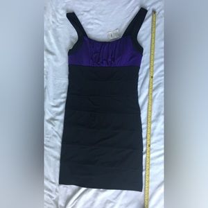 Purple/black short bodycon dress.